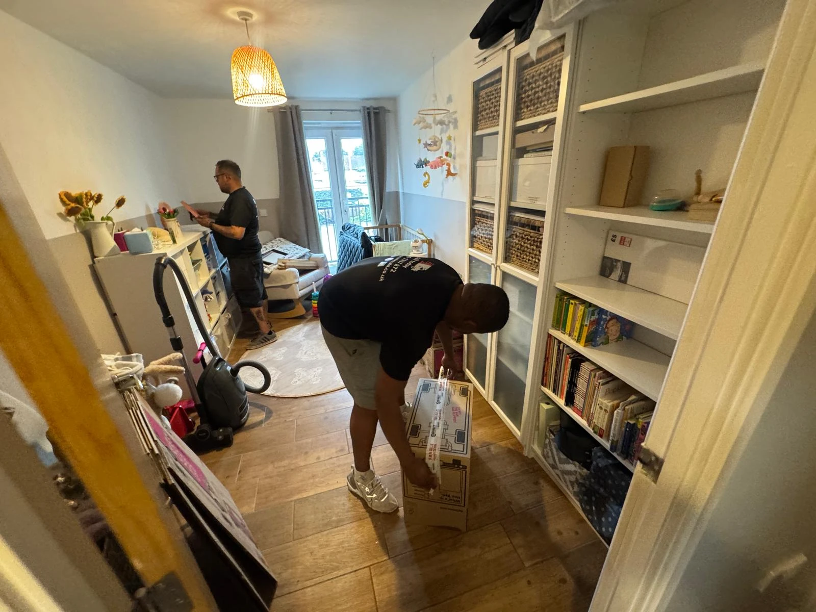 Two men packing 