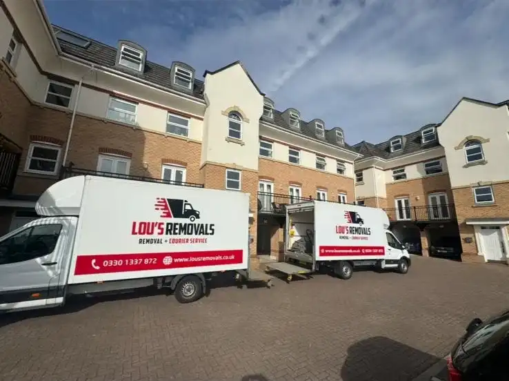 2 removal vans outside the property.